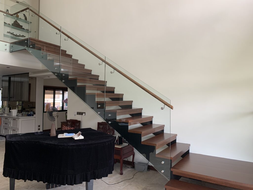 Mixed-material staircase (wood + glass + steel)