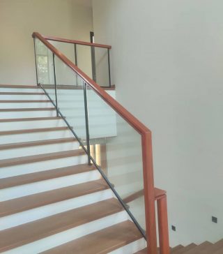 Recently Completed Job: Tempered Glass Railings with Wood Handrail
